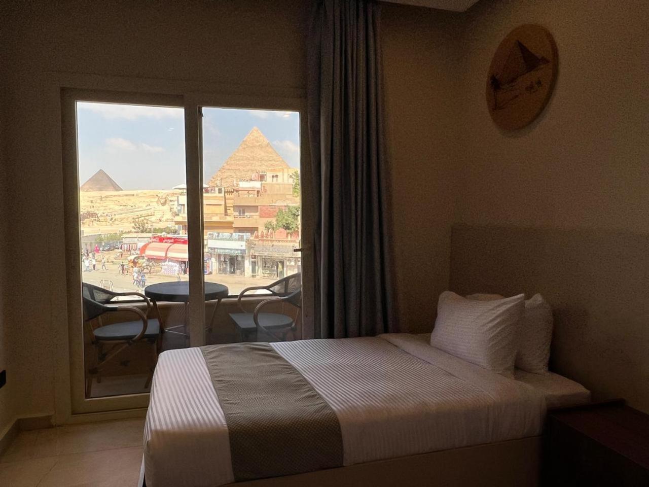 Pyramids Island Bed & Breakfast Kafret el-Gabal Екстериор снимка